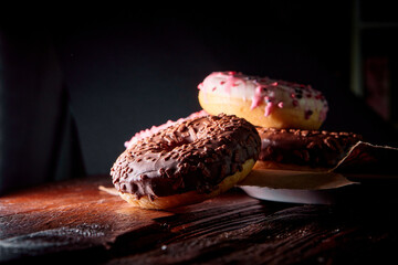 donuts placed on a wooden table