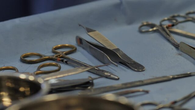 Surgeon and surgical tools closeup