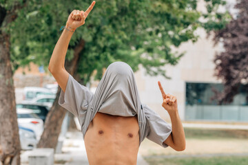 young fan celebrating success in the street