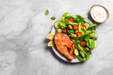 Roasted Salmon fish steak and vegetable salad