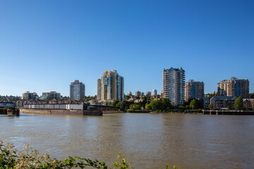 Obraz premium Apartment Buildings on the waterfront in Downtown of New Westminster City