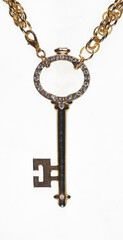 golden key with golden chain isolated on white background