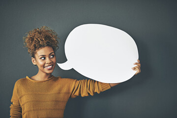 Woman holding speech bubble, chat board and blank copy space poster for voicing opinions, talking on social media or sharing ideas. Creative speaking about marketing strategy, innovation or vision