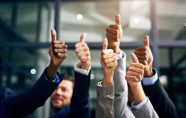 Thumbs up with hands of a business team or group giving their approval, saying thank you or giving...