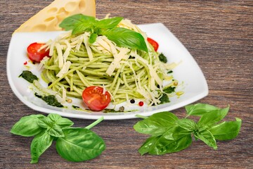 Pasta with basil pesto sauce. Tasty dish