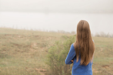 young girl was alone in nature