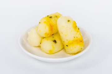 Long Rasgulla Also Know as Rosogolla, Roshogolla, Rasagola, Ras Gulla, Anguri Rasgulla or Angoori Rasgulla a Dessert Popular in India - Indian sweet food isolated on white background