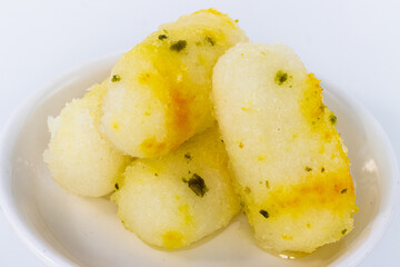 Long Rasgulla Also Know as Rosogolla, Roshogolla, Rasagola, Ras Gulla, Anguri Rasgulla or Angoori Rasgulla a Dessert Popular in India - Indian sweet food isolated on white background