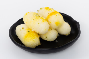 Indian sweet desert Long Rasgulla Also Know as Rosogolla, Roshogolla, Rasagola, Ras Gulla, Anguri Rasgulla or Angoori Rasgulla a Dessert Popular in India food isolated on white background