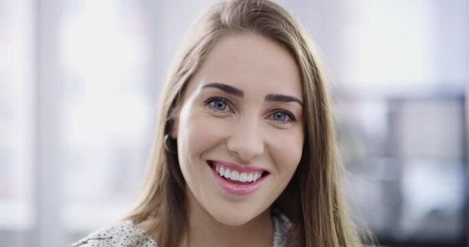 Beauty, happiness and flawless perfection with the face of a beautiful woman smiling while feeling happy and carefree. Portrait and headshot of a young female with healthy teeth and a bright smile
