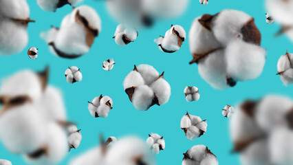 Balls of cotton on a turquoise background.
