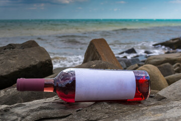 Bottle of wine by the sea