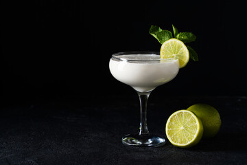 Lime and coconut cocktail drink summer alcohol beverage close up