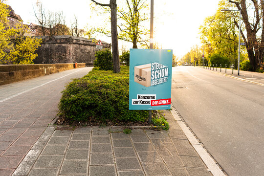 Nuremberg, Bavaria, Germany 04 16 2019: Campaign poster for European Parliament elections of the left-wing party Die Linken criticizing amazon and other corporations for not paying taxes