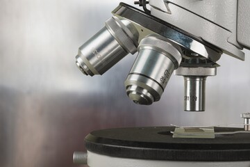 scientist prepare blood sample for research on microscope. Placing blood sample on slide. Science and medicine concept.