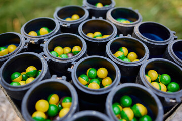 paintball extreme sport equipment bullet multicolored balls. - obrazy, fototapety, plakaty