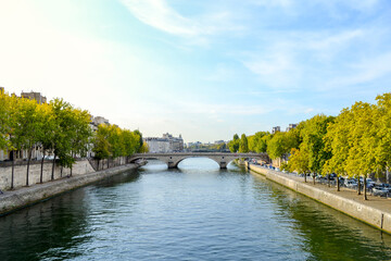 Fototapeta na wymiar View of the River Seine, in Paris, during an autumn afternoon with a warm blue sky