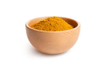 Turmeric powder in bowl isolated on white background.