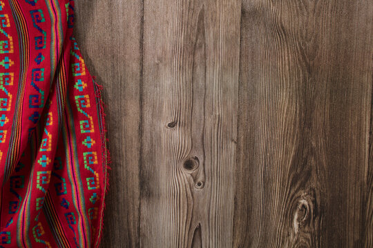 Wooden Table With Mexican Party Tablecloth