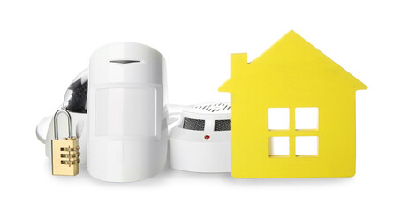 House model, CCTV camera, lock, smoke and movement detectors on white background. Home security...