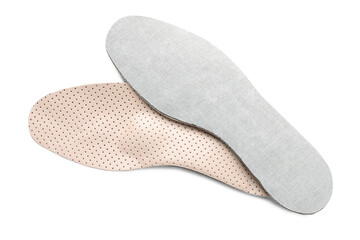 Beige orthopedic insoles isolated on white, top view