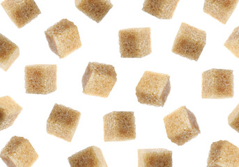 Flying cubes of brown sugar on white background
