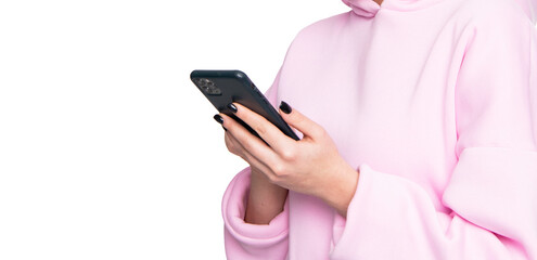 Woman crop view in casual pink hoodie using smartphone isolated on white, social networking