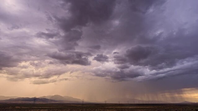 Rain storm moving in timelapse over Rush Valley Utah during summer monsoon season.