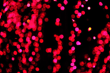 Fototapeta na wymiar Christmas tree lights, Colorful out of focus Christmas tree lights blurred