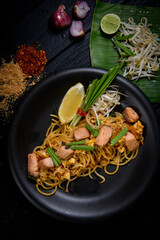 Pad Thai - stir-fried rice noodles with salmon - Thai food style
