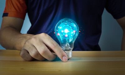 New technology invention concept, man in hand holding light bulb with gears icons, innovation and...