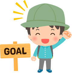 アウトドア装備の男性とゴールの立て看板