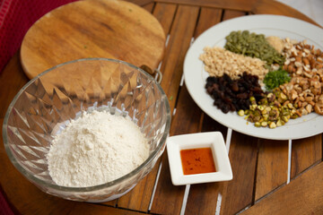 Healthy breakfast concept. A dish full of seed and nut . Pumpkins, raisin, chestnut, almond.