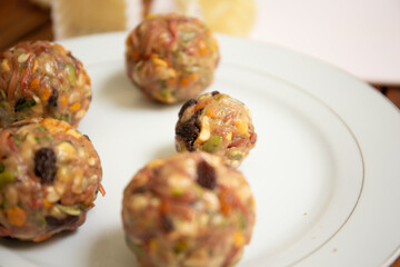 Female hands making dough for mooncake, homemade cantonese moon cake pastry on baking tray before baking for traditional festival. Travel, holiday, food concept