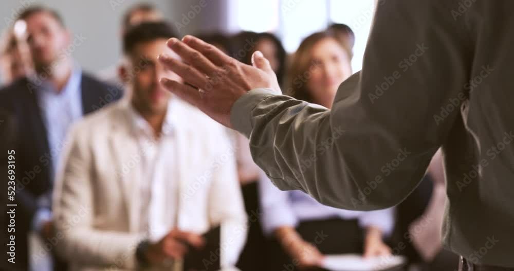 Canvas Prints Businessman giving a presentation to coworkers at a corporate conference. Closeup of an executive using hand gestures while speaking to his team. Professional leader talking in a business meeting.