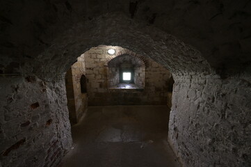 Bright sunlight finding its way into the interior of a coastal fortress in kent.