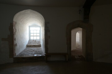 Bright sunlight finding its way into the interior of a coastal fortress in kent.