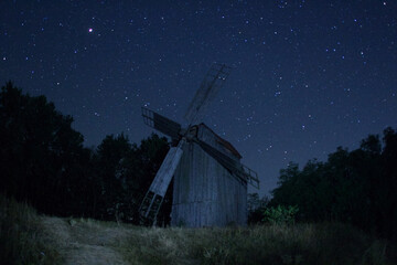 old windmill at night © Тетяна Харченко