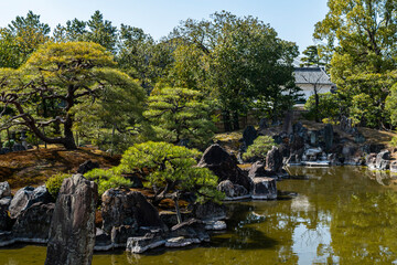 Traditional Japanese Garden with Pond and Pine Trees in Arashiyama, Kyoto