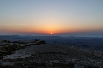 Fototapeta na wymiar Sunrise Times of Makhtesh Ramon crater. Israel, Negev desert. (Local time: ‎August ‎12, ‎2022, ‏‎6:09:09 AM)