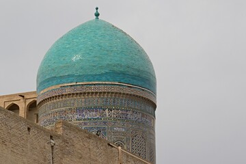 Mir Arab Madrasa at the Poi Kalyan complex in Bukhara, Uzbekistan. UNESCO heritage site - obrazy, fototapety, plakaty