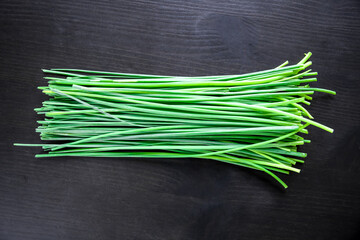 Bunch of chives isolated on black