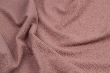 Russian shiny black astrakhan caracul - Lamb fur. Background for winter fashion theme and holiday...