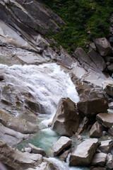 Scenic view of Reuss River at famous Schöllenen Gorge on a sunny summer day. Photo taken July 3rd,...