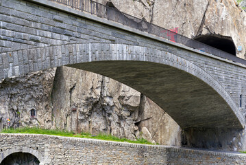 Famous Devil's Bridge at Sch&ouml;llenen Gorge, Canton Uri, on a sunny summer day. Photo taken July 3rd, 2022, Andermatt, Switzerland.