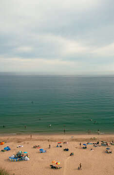 beach and sea - swimmers and sunbathers on Bournemouth Beach