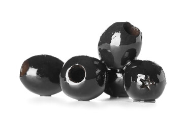 Heap of black olives on white background