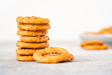 Flat lay of salty cracker pretzel rings on vintage  background