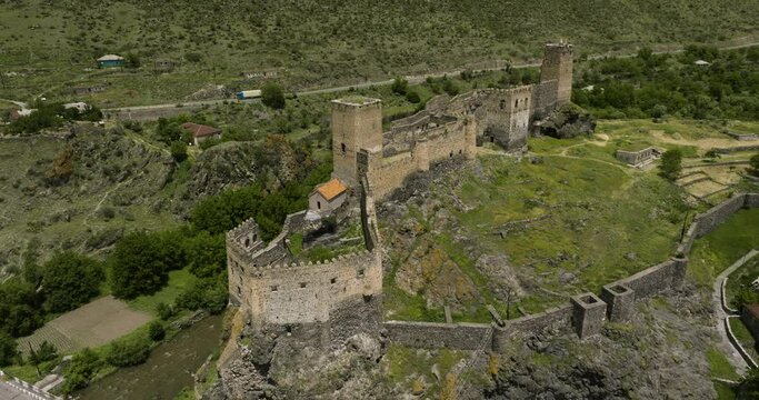 Aerial View Of Khertvisi Fortress Atop Rocky Hill In Gorge At Confluence Of Mtkvari And Paravani Rivers In Southern Georgia. 
