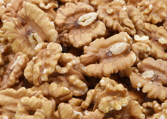 Lot of walnuts background. Food texture concept